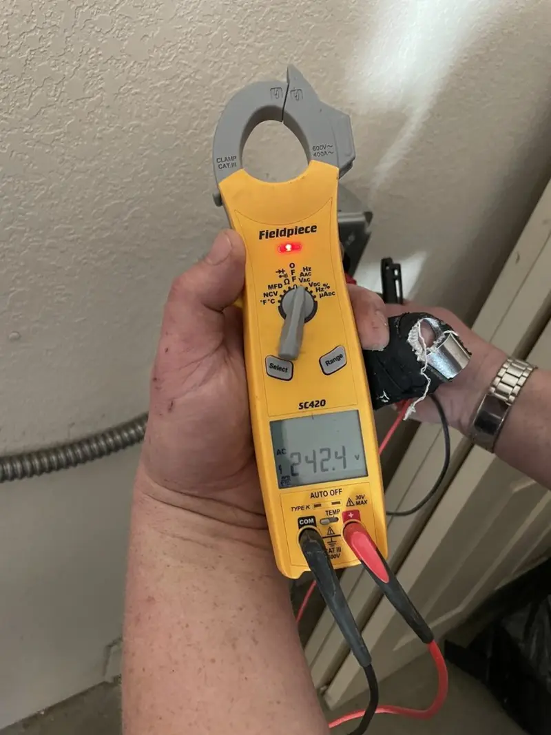 Voltage testing with clamp meter during Outlet Installation in Live Oak